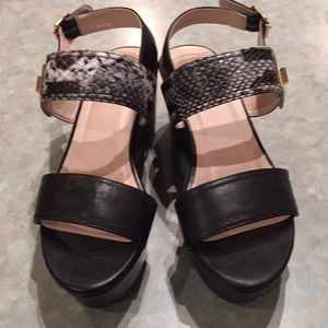 Alexis Harrison platform sandals.